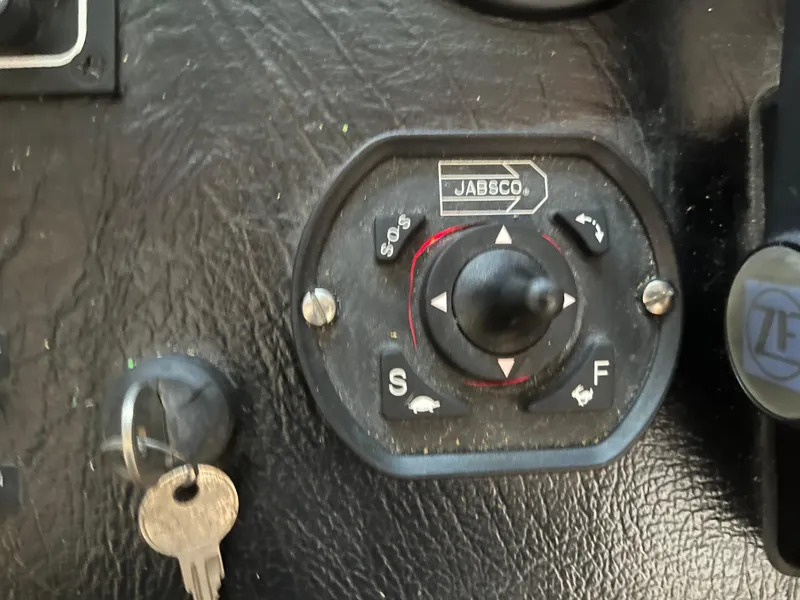 Slide: The Image of Control panel with Jabsco switch and key, Majestic 90 X 18, 2003 model. - 12