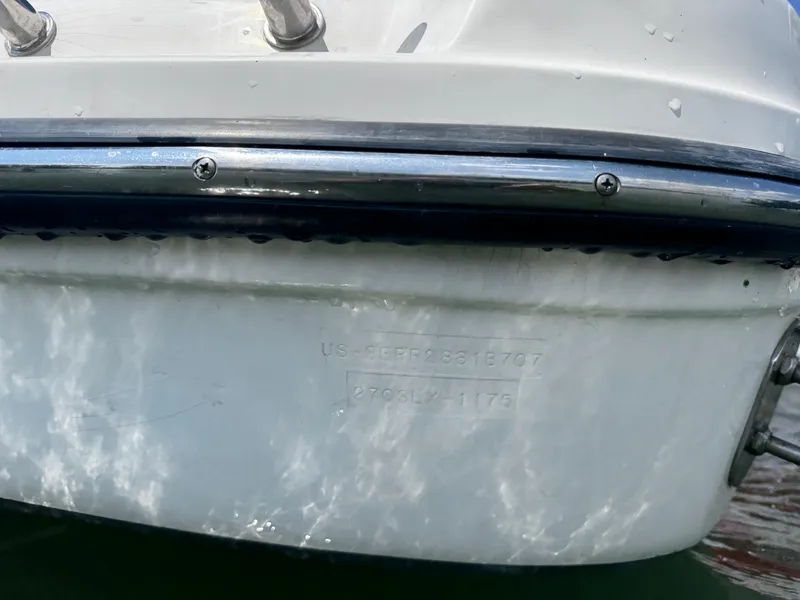 Slide: The Image of Close-up of 2007 Sea Ray 270 SLX boat hull with identification numbers. - 27