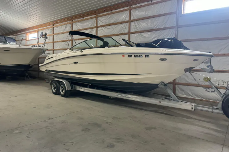 Slide: The Image of 2007 Sea Ray 270 SLX boat on trailer in indoor storage facility. - 36