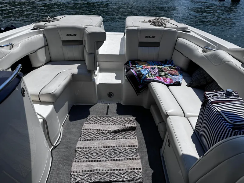 Slide: The Image of 2007 Sea Ray 270 SLX boat interior with plush seating and nautical accessories. - 7