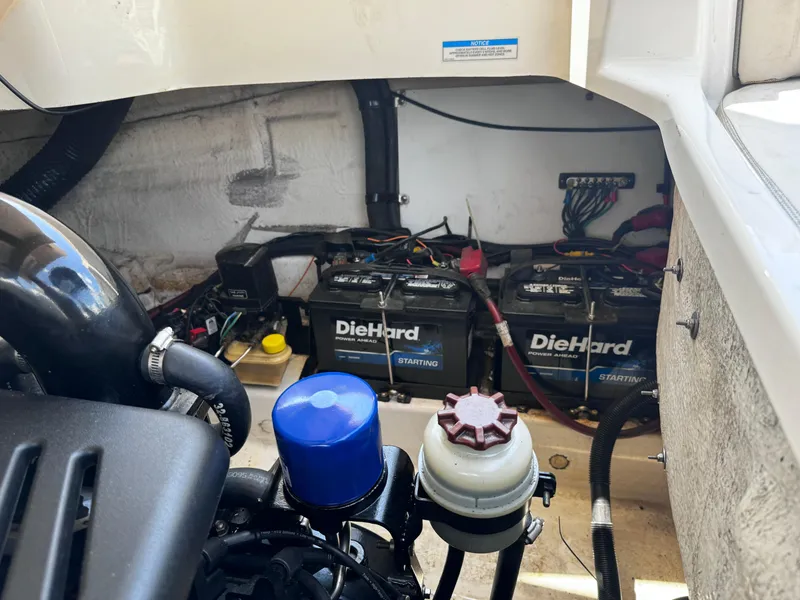 Slide: The Image of Engine compartment of a 2007 Sea Ray 270 SLX with DieHard batteries. - 24
