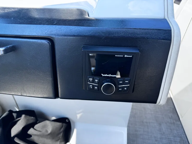 Slide: The Image of Rockford Fosgate audio system on 2007 Sea Ray 270 SLX boat dashboard. - 11