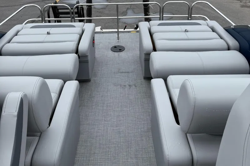 Slide: The Image of 2026 Bentley Pontoons 223 Quad Swingback with luxurious gray seating and spacious deck. - 13