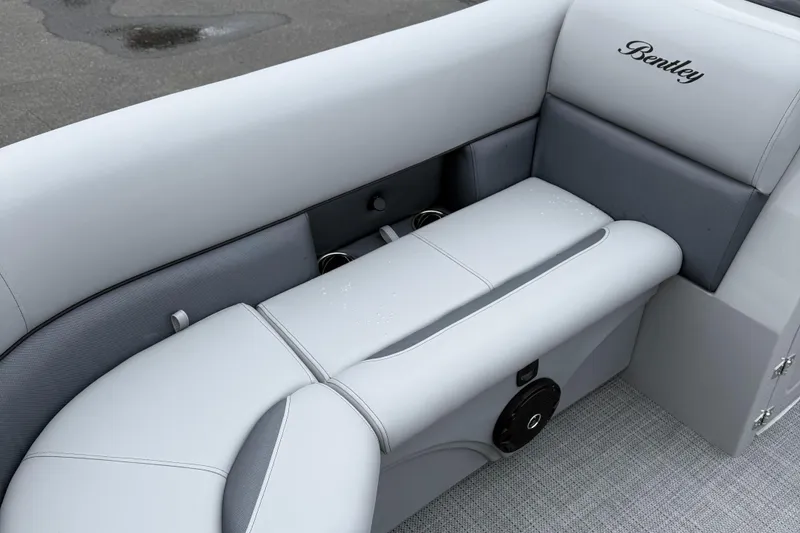 Slide: The Image of 2026 Bentley Pontoons 223 Quad Swingback interior seating with elegant gray upholstery. - 16