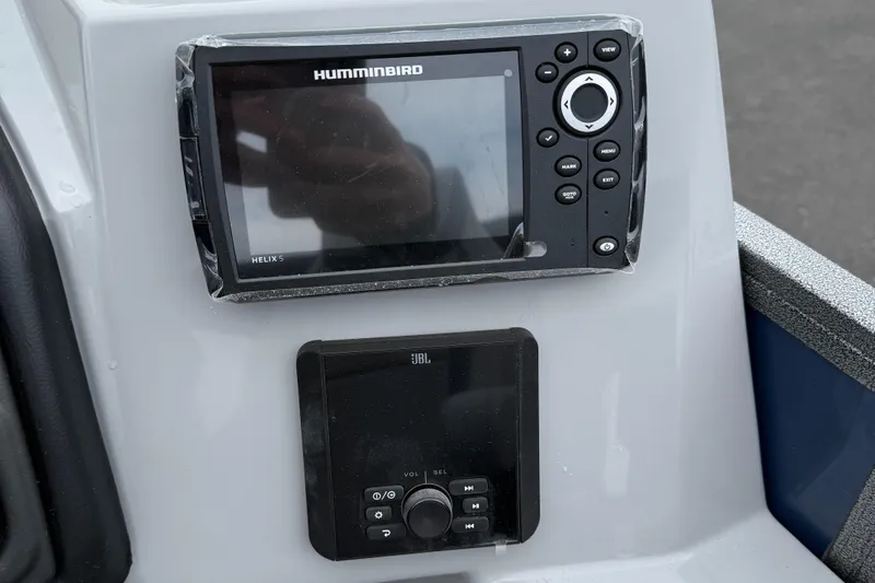 Slide: The Image of Control panel of 2026 Bentley Pontoons 223 Quad Swingback with Humminbird Helix 5 and JBL audio system. - 9