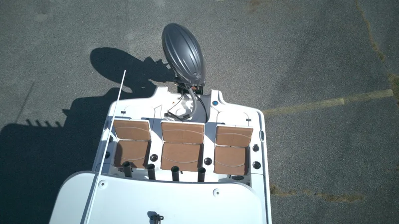 Slide: The Image of Overhead view of 2026 Sea Hunt BX22BR boat with three seats and outboard motor. - 6