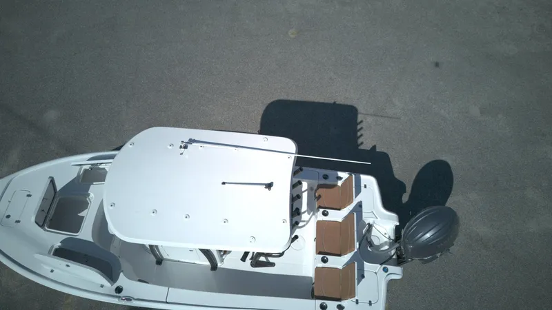 Slide: The Image of Aerial view of 2026 Sea Hunt BX22BR boat with seating and outboard motor. - 7