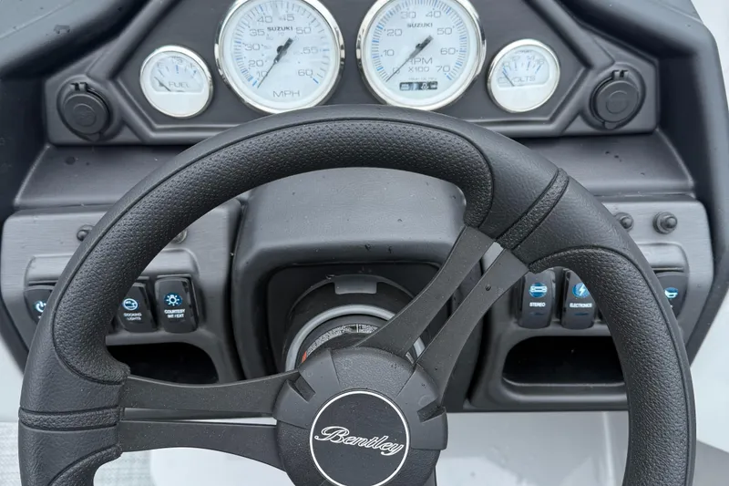 Slide: The Image of Steering wheel and dashboard of 2026 Bentley Pontoons Legacy 240 Cruise XL. - 11