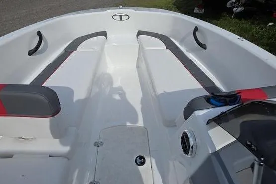 Slide: The Image of 2023 Tahoe T16 boat interior with white seating and gray accents. - 13