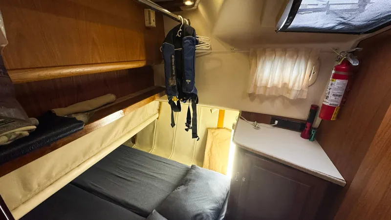 Slide: The Image of 1999 Mainship 350 Port Guest Stateroom - 20