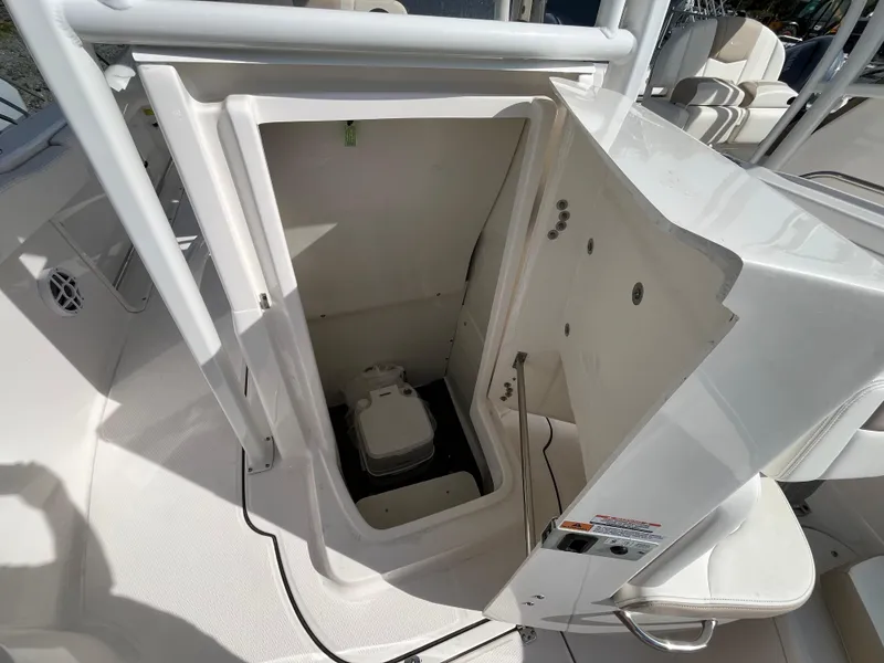 Slide: The Image of 2025 Robalo R222 Center Console boat interior storage compartment. - 10