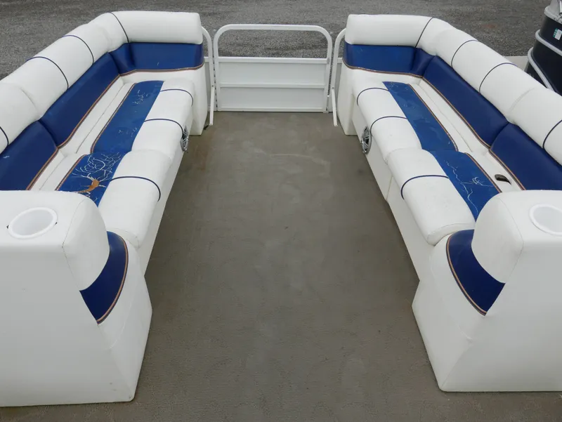 Slide: The Image of 2006 Bentley Pontoons 240 CRUISE interior with white and blue seating arrangement. - 5