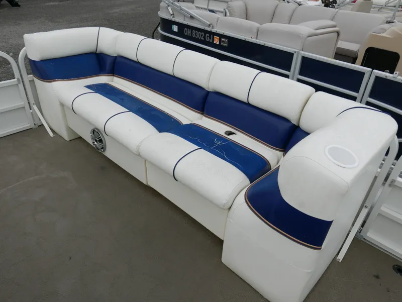 Slide: The Image of 2006 Bentley Pontoons 240 CRUISE boat seating with blue and white upholstery. - 7