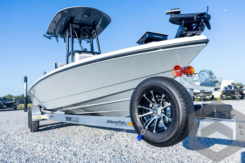 Slide: The Image of 2026 Pathfinder 2300 HPS boat on trailer, featuring sleek design and modern equipment. - 10