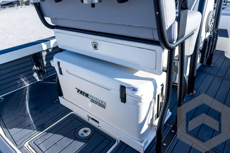 Slide: The Image of 2026 Pathfinder 2300 HPS boat interior with Engel cooler and seating. - 104