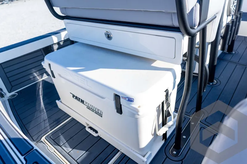 Slide: The Image of 2026 Pathfinder 2300 HPS boat interior with Engel cooler and seating. - 105