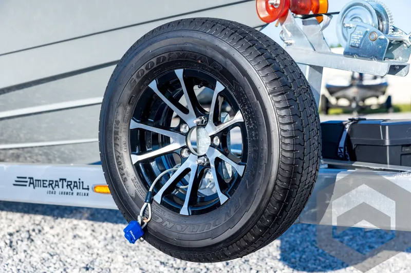Slide: The Image of Trailer wheel on AmeraTrail, featuring Pathfinder 2300 HPS, 2026 model. - 11