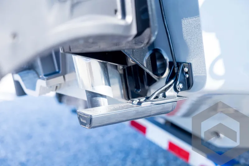 Slide: The Image of Close-up of 2026 Pathfinder 2300 HPS boat step detail, showcasing metal hinge and mechanism. - 120