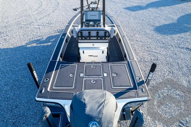 Slide: The Image of 2026 Pathfinder 2300 HPS boat, top view, featuring advanced Garmin navigation system. - 130