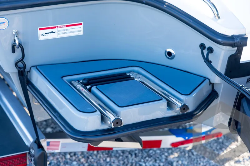 Slide: The Image of 2026 Pathfinder 2300 HPS boat ladder and platform detail, featuring sleek design and safety features. - 27