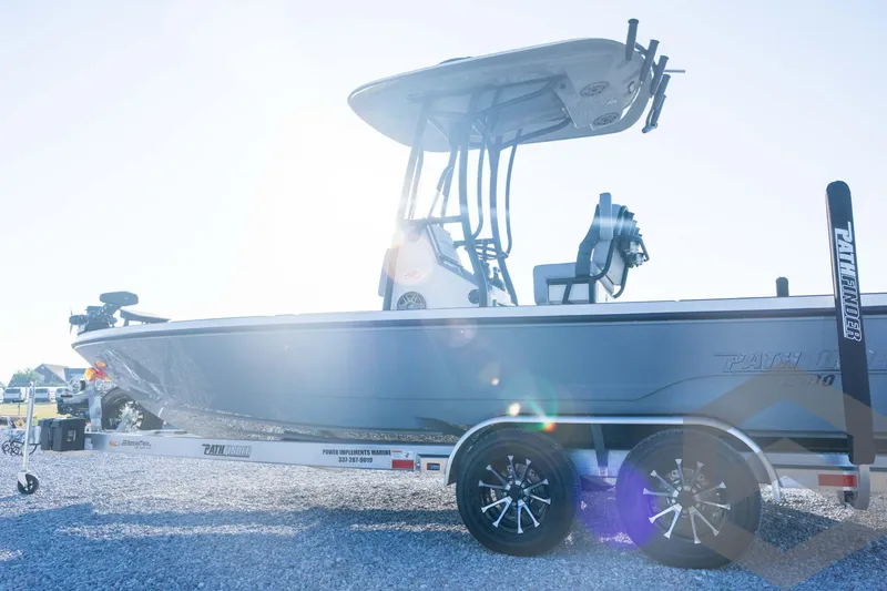 Slide: The Image of 2026 Pathfinder 2300 HPS boat on trailer, sunlit, side view. - 35