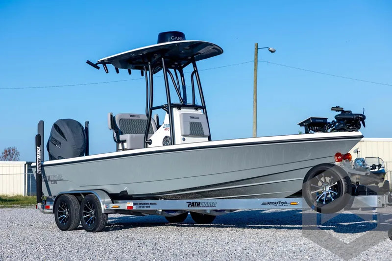 Slide: The Image of 2026 Pathfinder 2300 HPS boat on trailer, featuring sleek design and modern equipment. - 4
