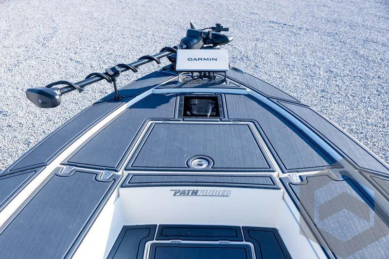 Slide: The Image of 2026 Pathfinder 2300 HPS boat deck with Garmin equipment, featuring sleek design and advanced technology. - 53