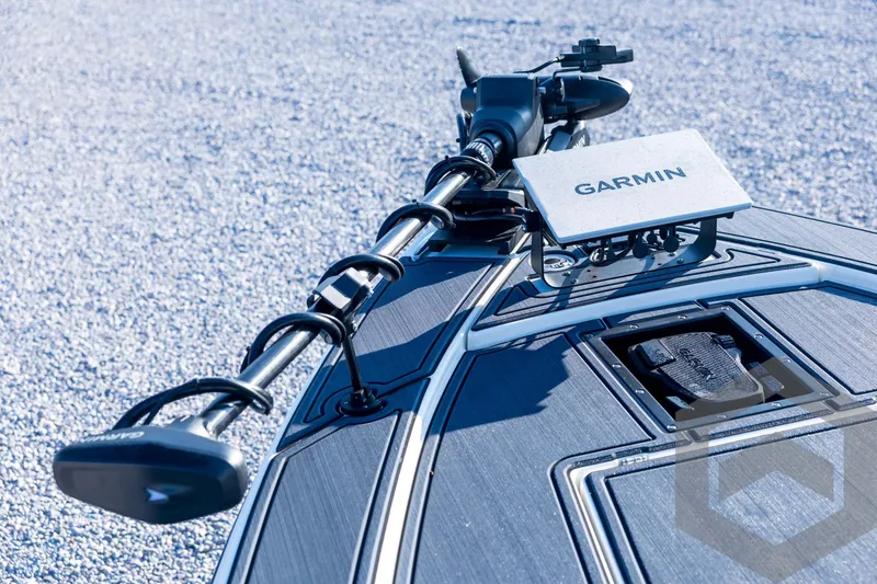 Slide: The Image of 2026 Pathfinder 2300 HPS boat with Garmin navigation system on deck. - 54