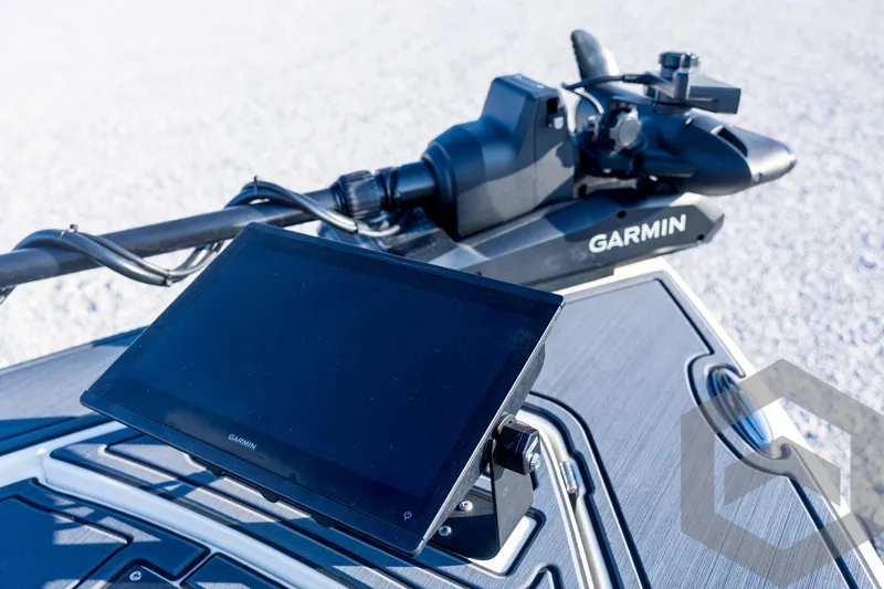 Slide: The Image of 2026 Pathfinder 2300 HPS boat with Garmin navigation system on deck. - 57