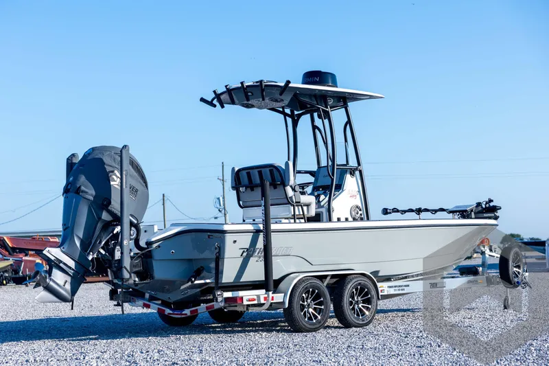Slide: The Image of 2026 Pathfinder 2300 HPS boat on trailer, featuring powerful outboard motor. - 6
