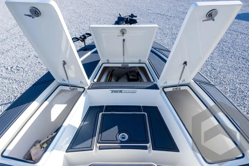 Slide: The Image of 2026 Pathfinder 2300 HPS boat storage compartments open, showcasing spacious design. - 60