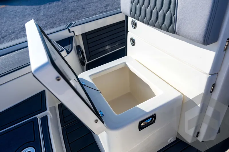 Slide: The Image of Open storage compartment on 2026 Pathfinder 2300 HPS boat, featuring sleek design and functionality. - 68