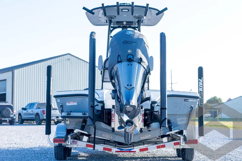 Slide: The Image of 2026 Pathfinder 2300 HPS boat on trailer, rear view, in outdoor setting. - 7
