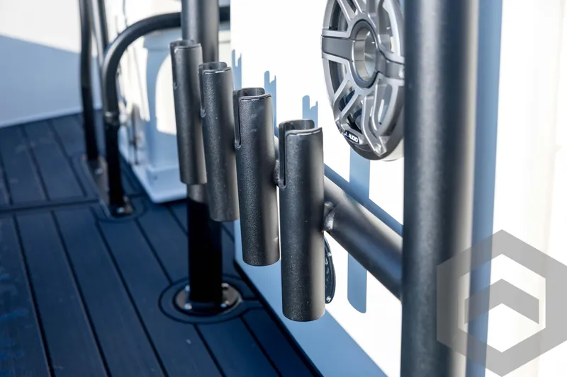 Slide: The Image of 2026 Pathfinder 2300 HPS boat rod holders and speaker on deck. - 71