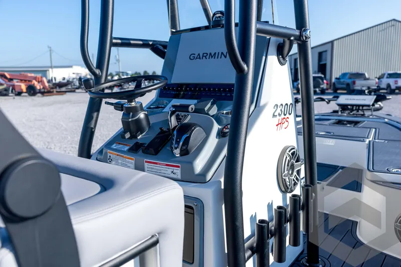 Slide: The Image of 2026 Pathfinder 2300 HPS boat console with Garmin navigation system. - 78