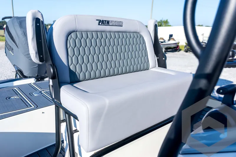 Slide: The Image of 2026 Pathfinder 2300 HPS boat seat with hexagonal pattern and sleek design. - 90