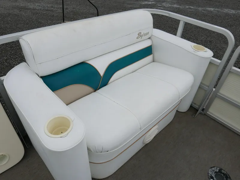 Slide: The Image of White and teal boat seat on 1996 Sylvan 820 Cruise Special Edition. - 7