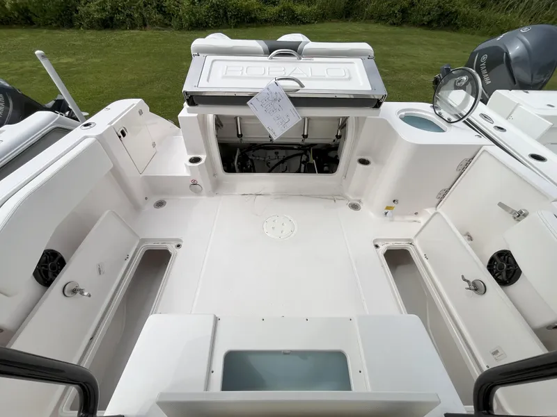 Slide: The Image of 2025 Robalo R270 Center Console boat interior with sleek design and modern controls. - 4