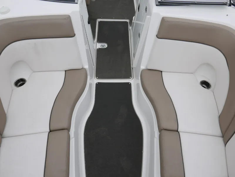 Slide: The Image of Interior of 2011 Yamaha SX240 boat with beige and white seating. - 10