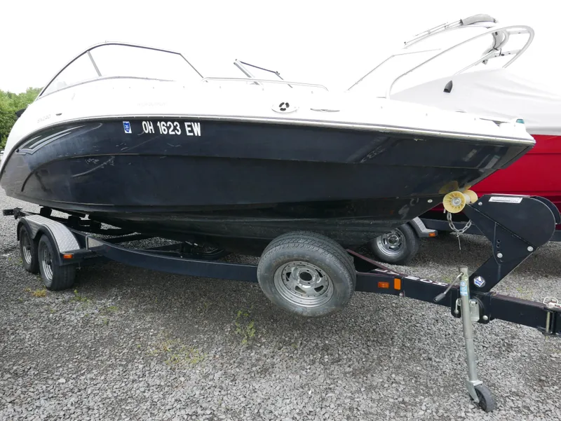 Slide: The Image of 2011 Yamaha SX240 boat on trailer, side view. - 2