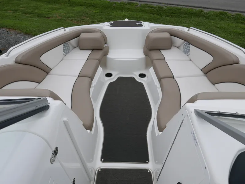 Slide: The Image of Interior of a 2011 Yamaha SX240 boat with beige seating. - 7
