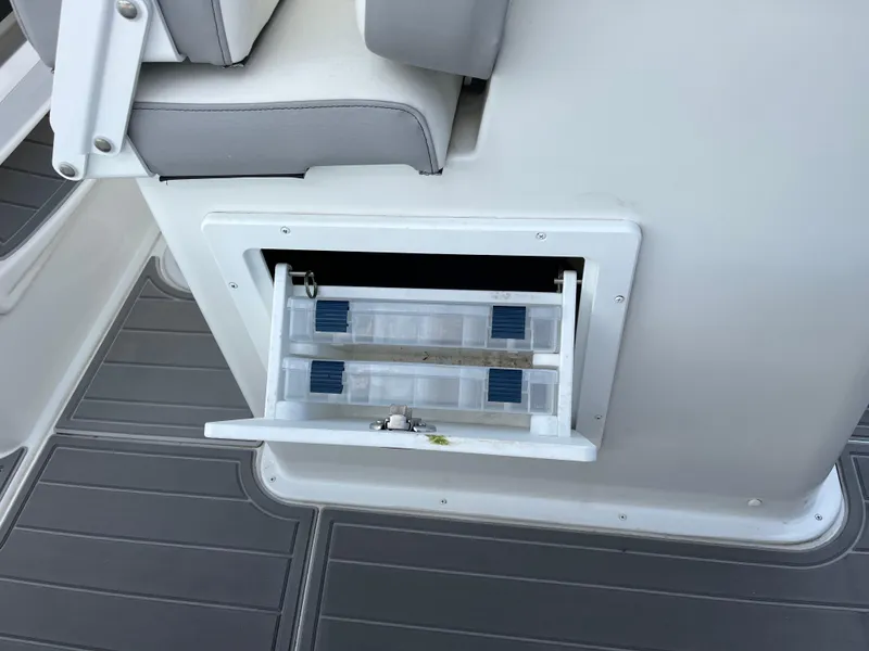 Slide: The Image of Fuel cap on 2024 Parker 2400 Center Console boat, close-up view. - 12