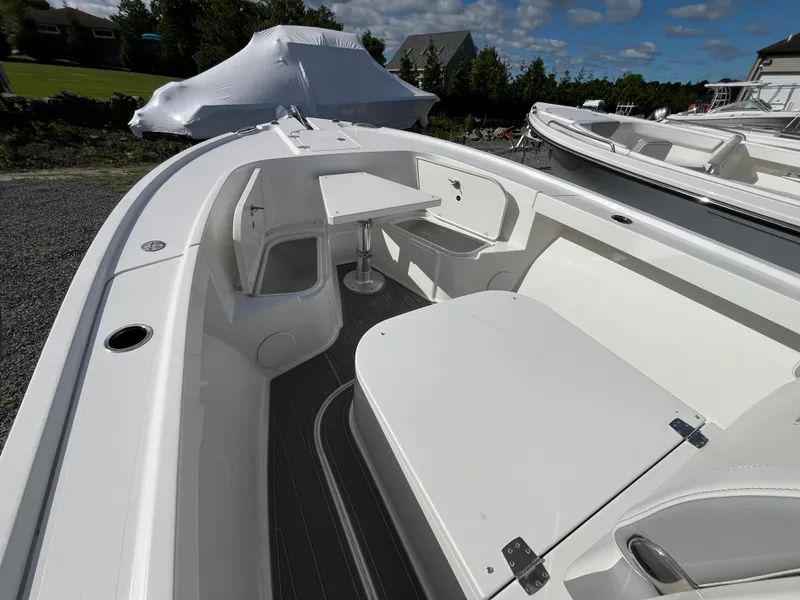Slide: The Image of 2024 Parker 2400 Center Console boat anchor and chain storage compartment. - 8