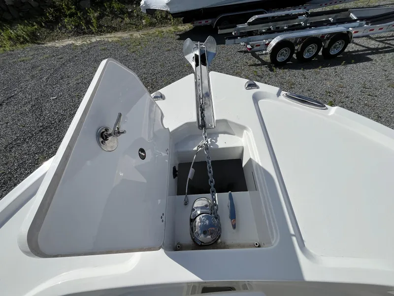 Slide: The Image of 2024 Parker 2400 Center Console boat, showcasing sleek design and spacious deck. - 9