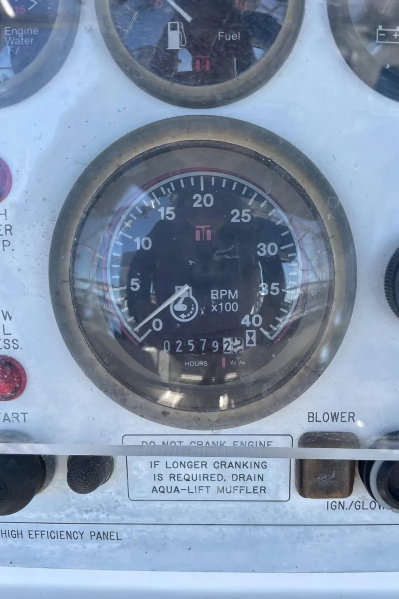 Slide: The Image of Close-up of a Catalina 400 1998 boat engine control panel with RPM gauge. - 14