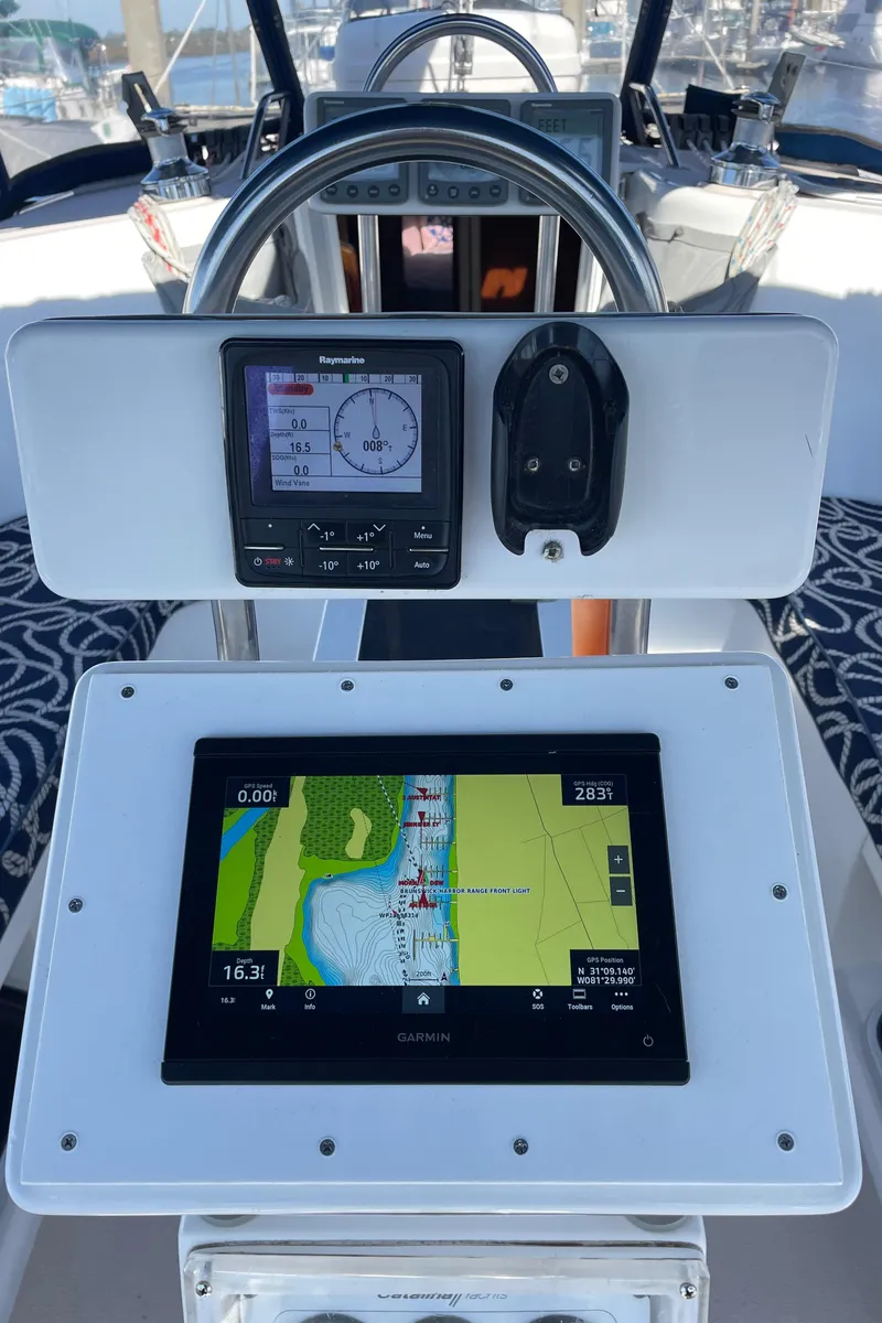 Slide: The Image of Sailboat cockpit with navigation instruments on a 1998 Catalina 400. - 16