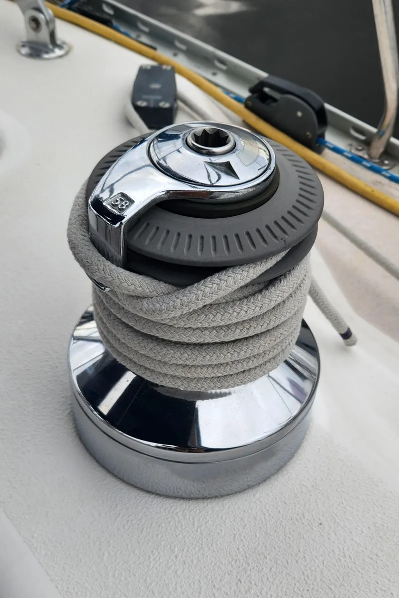Slide: The Image of Winch on 1998 Catalina 400 sailboat with coiled rope. - 20
