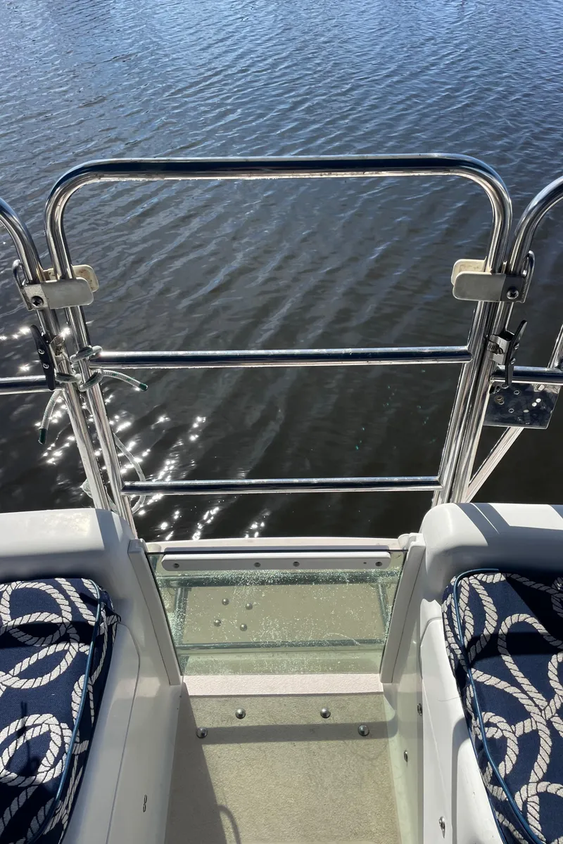 Slide: The Image of Catalina 400 sailboat deck view with nautical-themed seating, overlooking water. - 31