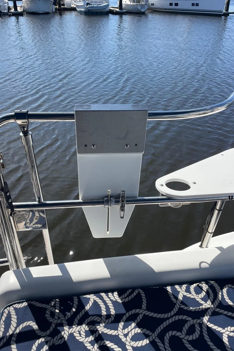 Slide: The Image of Sailboat deck view, Catalina 400, 1998, with nautical-themed seating and marina backdrop. - 32