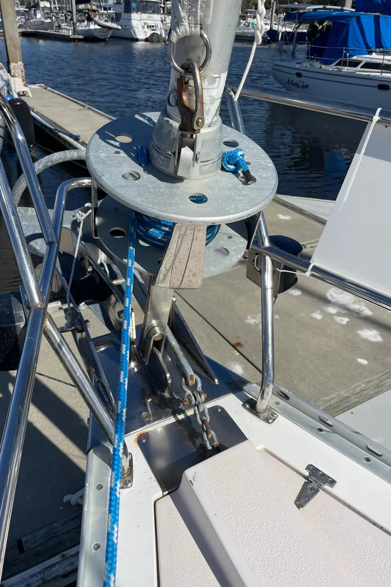 Slide: The Image of Close-up of a 1998 Catalina 400 sailboat's rigging and deck at a marina. - 45